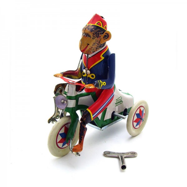 Monkey Rides Bike Wind Up Tin Toy