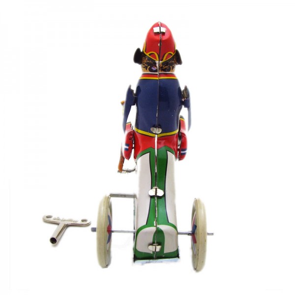 Monkey Rides Bike Wind Up Tin Toy